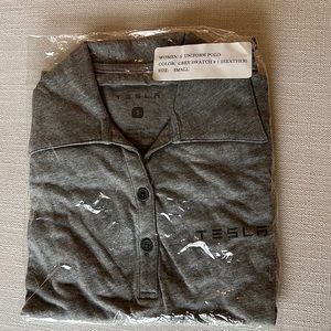 Tesla women’s polo size S made for Tesla employees. Brand new in wrapping.